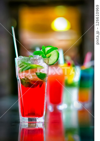Glasses of cocktails on bar background Glasses of cocktails on bar background 126610969