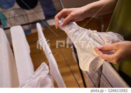 Laundry Day Freshly Cleaned Underwear Elegantly Hanging Outside to Dry in the Sun Laundry Day Freshly Cleaned Underwear Elegantly Hanging Outside to Dry in the Sun 126611082