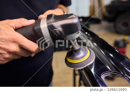 Expert and Professional Car Polishing Using Precision Tools for Exceptional Results 126611093