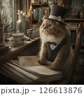 本を見ながら調べものをする猫 126613876