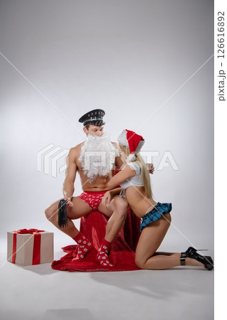 Couple engages in playful roleplay during a themed adult game night Couple engages in playful roleplay during a themed adult game night 126616892