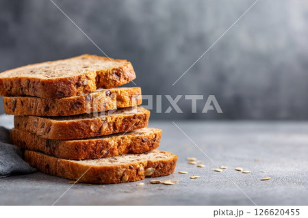 tempting brown bread in the minimalist corner on a light gray background 126620455