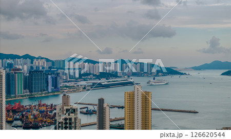 Skyline with Waterfront and Industrial Docks in a Vibrant Cityscape Skyline with Waterfront and Industrial Docks in a Vibrant Cityscape 126620544