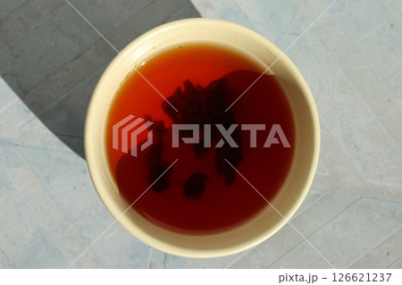 Chinese tea cup with black tea. Chinese tea cup with black tea. 126621237