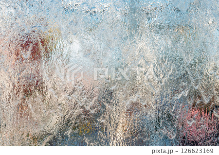 Aqua background. Product space next to clean water streams and water splashes and drops. 126623169