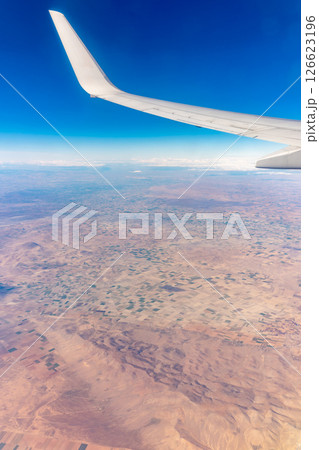 Aerial view on arabian desert and Red sea mountains from airplane 126623196