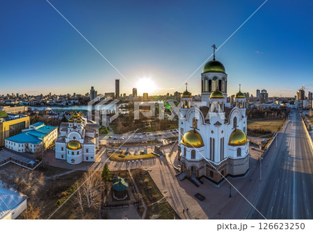 Early spring or autumn Yekaterinburg and Temple on Blood in clear sunset. Aerial view of Yekaterinburg, Russia. Translation of the text on the temple: Honest to the Lord is the death of His saints. 126623250