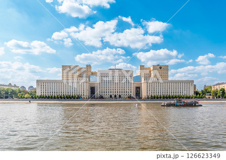 View of the Ministry of Defence of Russian Federation, and Moscow river embankment with cruise ships at sunset. View of the Ministry of Defence of Russian Federation, and Moscow river embankment with cruise ships at sunset. 126623349
