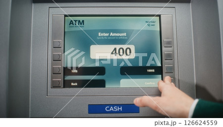 Unrecognizable Person Entering PIN Code. Error Message on Cash Machine Display Due to Blocked Bank Account 126624559