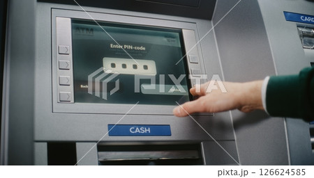 ATM User Entering PIN Code on ATM Keypad. Error Message on Cash Machine Due to Incorrect PIN Code 126624585