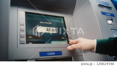 ATM User Entering PIN Code. Error Message on Cash Machine Screen Due to Lack of Cash 126624598