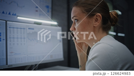 Businesswoman Angry About Stock Market Crash Talking on Phone, Analyzing Exchange Market Charts 126624983