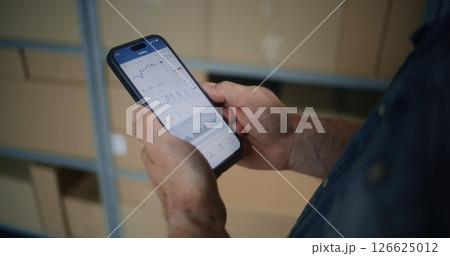 Worker Monitoring Exchange Market Charts Using Smartphone in Warehouse Worker Monitoring Exchange Market Charts Using Smartphone in Warehouse 126625012