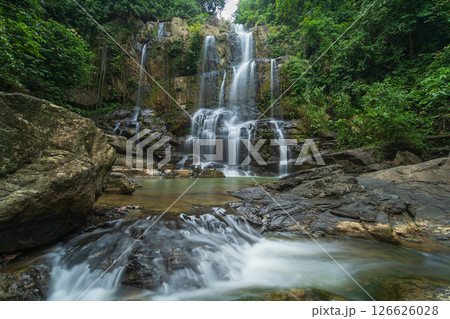 waterfalls in deep forest National Park ,Kanchanaburi ,A beautiful stream water famous rainforest waterfall in Thailand	 126626028