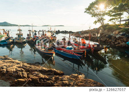 Colorful Fishing Boats Docked in the Morning 126627037