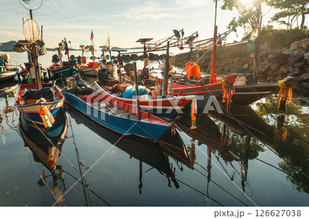 Colorful Fishing Boats Docked in the Morning 126627038