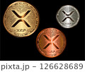 Gold, silver and bronze XRP cryptocurrency coin isolated on a black background. Financial business. XRP coin set. 126628689