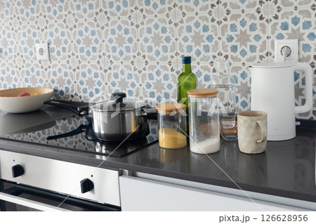Real home kitchen countertop in Mediterranean style. Concept everyday life, healthy cooking 126628956