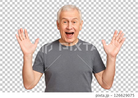 PNG happy elderly man in grey t shirt with raised hands and surprised expression isolated on transparent background. Concept of excitement, positive emotions, joyful senior portrait for design 126629075