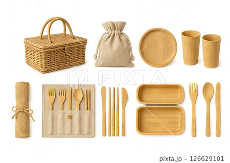 Png eco-friendly picnic set with wicker basket, cutlery, and bamboo items isolated on transparent background. concept of sustainable outdoor dining, zero waste, reusable picnicware. 126629101