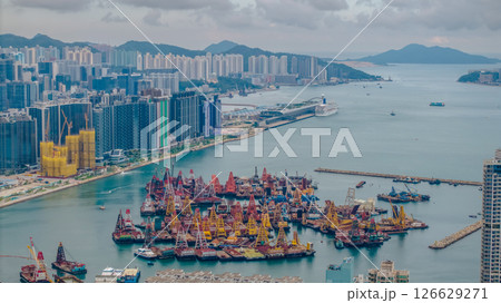 Vibrant Harbor and Skyline View in Busy Urban Waterfront Area 126629271