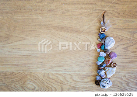 Colorful hobby collection, natural sea summer object on wooden surface background with copy space. 126629529