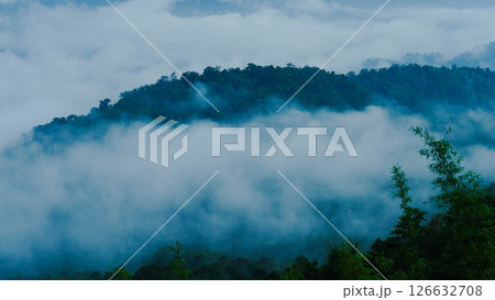 Aerial view of fog flowing over a mountain landscape in northern Thailand. Aerial view of beautiful mountains and clouds with fog. Aerial view of fog flowing over a mountain landscape in northern Thailand. Aerial view of beautiful mountains and clouds with fog. 126632708