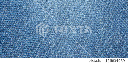 Old denim blue jeans fabric texture background Old denim blue jeans fabric texture background 126634089