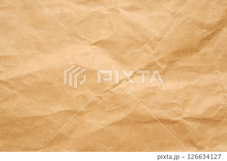 Abstract crumpled and creased recycle brown paper texture background Abstract crumpled and creased recycle brown paper texture background 126634127