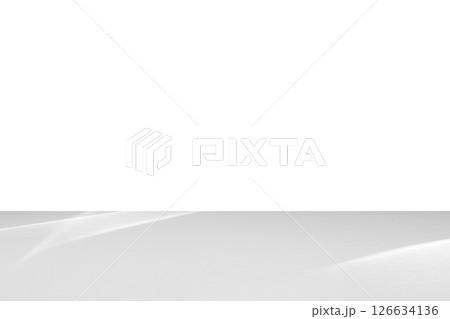 Empty white table top with shadow isolated on white background for montage product display 126634136