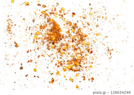 dried red chili pepper flakes and seeds isolated on white background 126634299