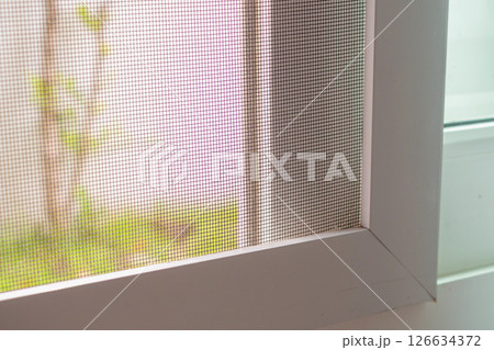 mosquito net wire screen on house window protection against insect 126634372