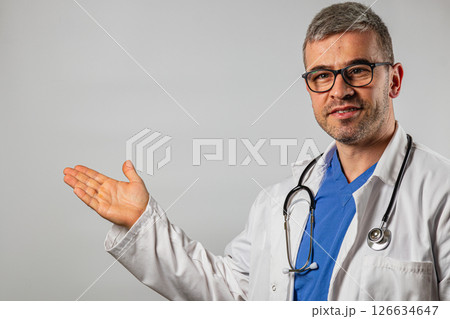 Medical professional presenting health information with a friendly demeanor Medical professional presenting health information with a friendly demeanor 126634647