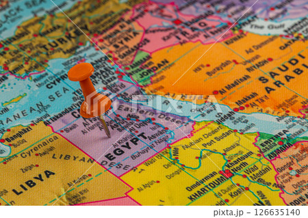 Exploring Egypt on a colorful map with a pushpin 126635140
