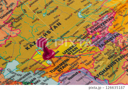 Pinpointing Turkmenistan on a colorful political map Pinpointing Turkmenistan on a colorful political map 126635187