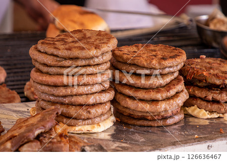 Grilled hamburgers stack sold on market Grilled hamburgers stack sold on market 126636467