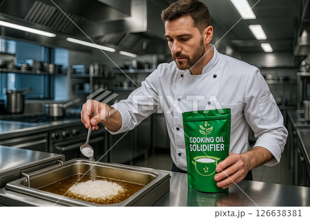 chef in restaurant kitchen adds oil solidifying powder fryer, concept sustainable waste management, plant-based non-toxic powder as solution disposing waste cooking fat and supporting green practices chef in restaurant kitchen adds oil solidifying powder fryer, concept sustainable waste management, plant-based non-toxic powder as solution disposing waste cooking fat and supporting green practices 126638381