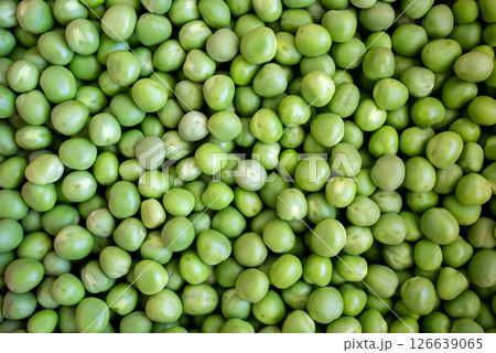 Close-up of fresh green peas. Close-up of fresh green peas. 126639065