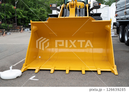 Buckets construction excavator on sky 126639285