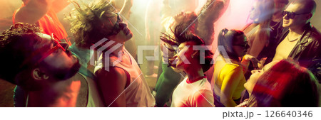 A lively party scene with a group of people dancing under colorful lights. Banner. A lively party scene with a group of people dancing under colorful lights. Banner. 126640346