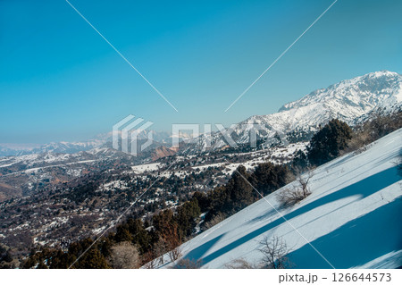 Amirsoy, Amirsay snowy rocks, mountains in Uzbekistan Amirsoy, Amirsay snowy rocks, mountains in Uzbekistan 126644573
