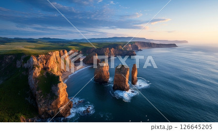 Dramatic Coastal Landscape with Rugged Cliffs and Sea Stacks at Sunset 126645205