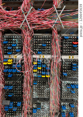 Telephone cross connection box. Fiber optical network cables panel Telephone cross connection box. Fiber optical network cables panel 126645639
