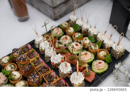 Small Canapes appetizers at the french wedding The Catering 126645665