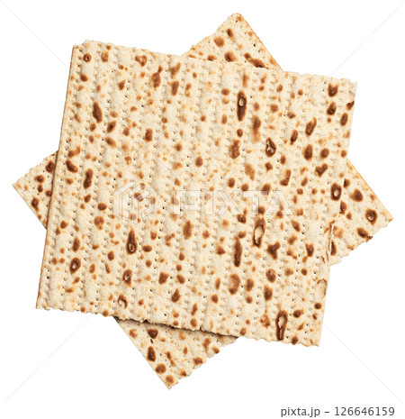 Two sheets of matzah stacked on top of each other, isolated on background. Two sheets of matzah stacked on top of each other, isolated on background. 126646159