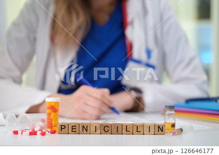 A Medical Professional is Writing a Prescription specifically for Penicillin to treat patients 126646177