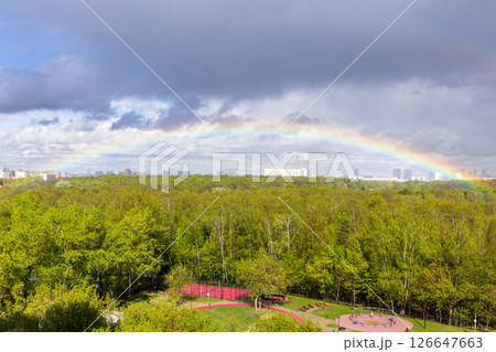 rainbow over green park and playground after rain 126647663