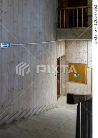 stairs and emergency exit from building 126647962