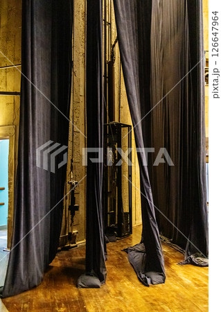 space between curtains on theatre stage 126647964