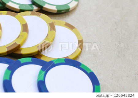 Casino chips on grey background. 126648824